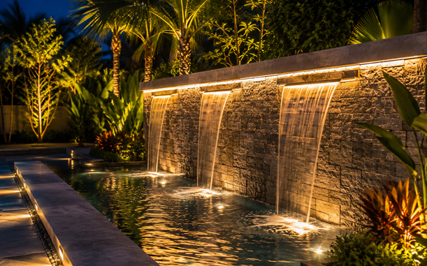 Underwater LED lighting in a Dubai garden water feature at night